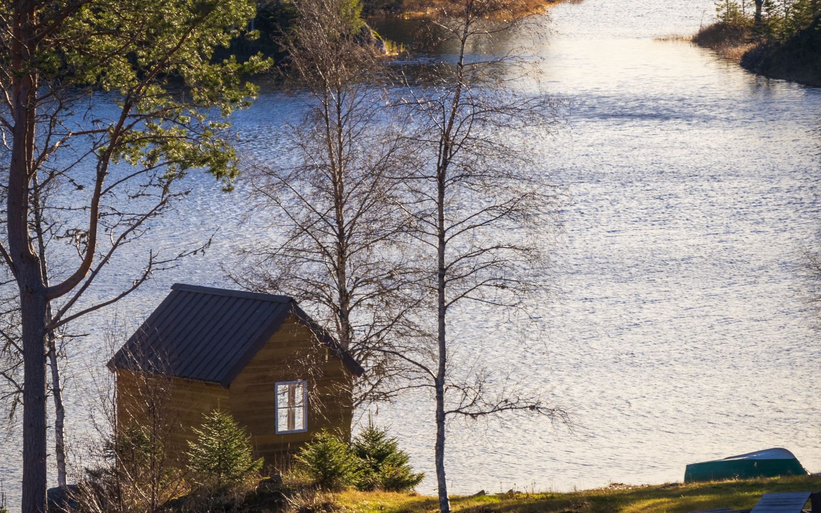 A cabin overlooking a quiet lake